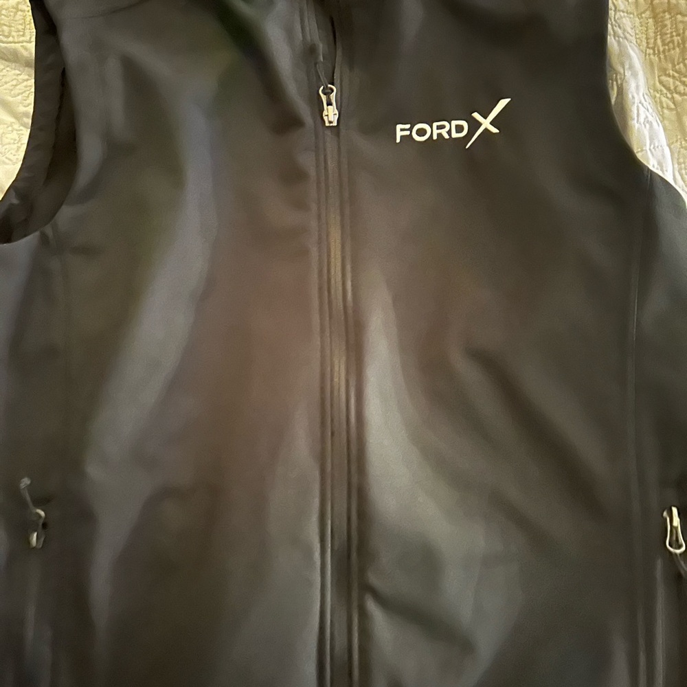 Port Authority Large best.  It is branded FordX.